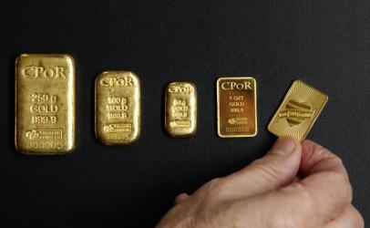 Oro cae ante fortalecimiento del dólar